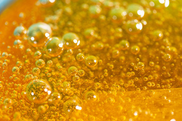 Liquid yellow paste for sugaring close-up. Depilation and hair removal concept. Macro photo.