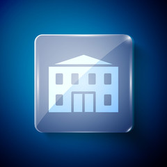 White School building icon isolated on blue background. Square glass panels. Vector