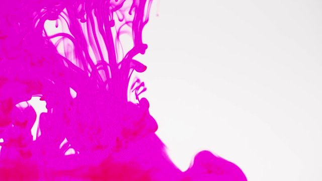 Pink color ink drop in water. Slow Movement background liquid and smoke dynamic blend