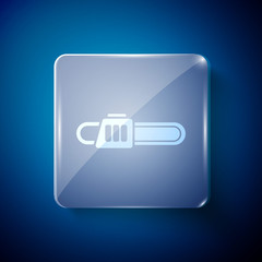 White Chainsaw icon isolated on blue background. Square glass panels. Vector