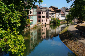 Fototapeta na wymiar Old half-timbered houses in Strasbourg. Summer Sunny urban landscape