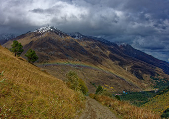 Fototapeta premium Autumn landscapes of the Cheget mountain gorge while climbing Mount Elbrus.