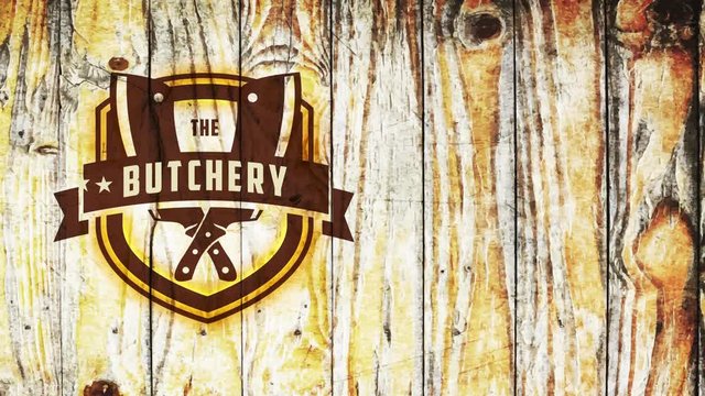 the butchery market rack sign board with meat cutlery crossed on western fancy border over tear wood background