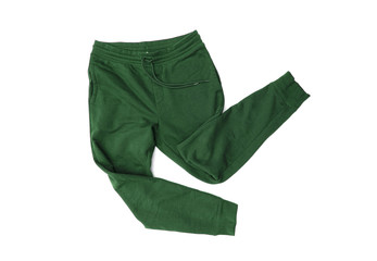 Close-up green sport pants, sweatpants, jogging for men isolated on white background