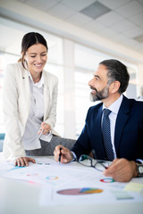 Business coworkers discussing new ideas and brainstorming in a modern office