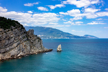 Crimea, Yalta. View of the sea and cliffs. Tourism in the Crimea. Summer photo of a sea landscape.