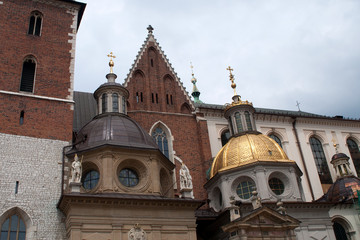 Krakow Poland,  view of the rooftop domes and ornamentation along the side of Wawel Cathedral