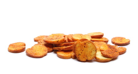 Bruschette chips, grilled bread crisps with tomatoes, olives and oregano, savory snacks isolated on white background