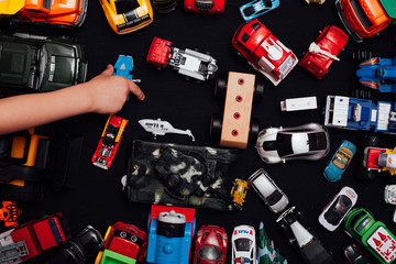 Children's cars toys for developing baby games on a black background