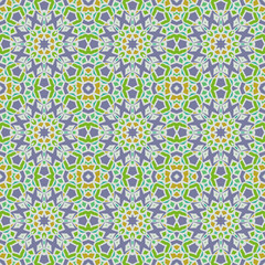 Trendy bright color seamless mandala pattern  in violet, green and blue for decoration, paper wallpaper, tiles, textiles, neckerchief, pillows. Home decor, interior design, cloth design.