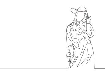 One single line drawing of young happy beauty muslimah wearing cute hat and pose nicely. Beautiful Asian woman model in trendy hijab fashion concept continuous line draw design vector illustration