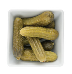 Small Cucumber - appetizer of vegetables in olive oil. Homemade preserves as a side dish or aperitif
