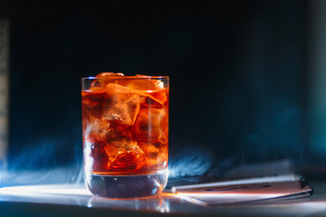 Black russian cocktail with ice and coffee liquor. Selective focus. Shallow depth of field.