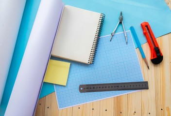 Still life, business, stationery or education concept: top image with blank pages, notebook, ruler,...