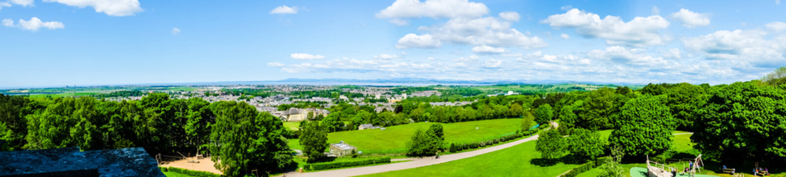 The cityscape of Lancaster, with Morecambe Bay viewed from the Ashton Memorial in Williamson Park.