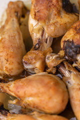 baked chicken legs close-up. tasty background