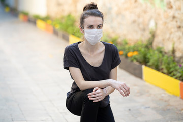 Fototapeta premium coronavirus mask and woman portrait