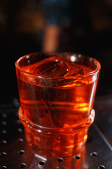 Black russian cocktail with ice and coffee liquor. Selective focus. Shallow depth of field.