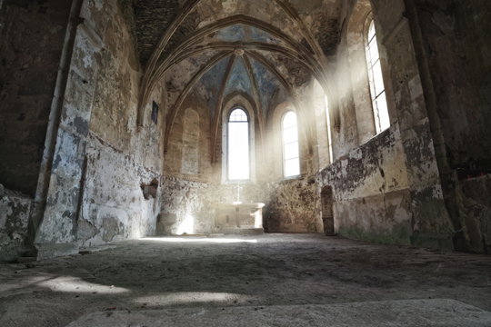 inside of an old decayed church
