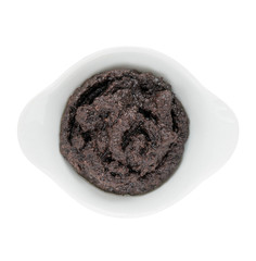 black olive paste in a white bowl