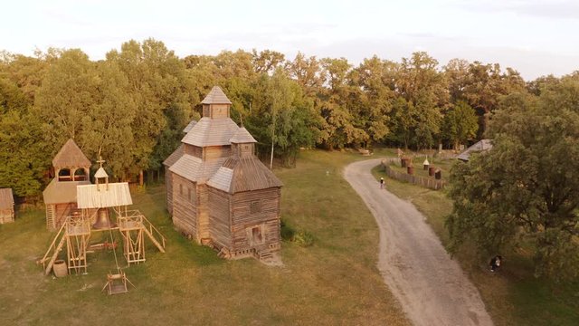 Old wooden village church, top view. Medieval peasant lifestyle.