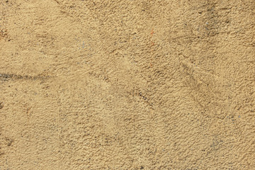 abstract background of an old light brown wall with embossed decoration