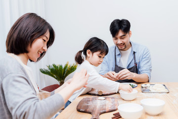 Family cooking at home