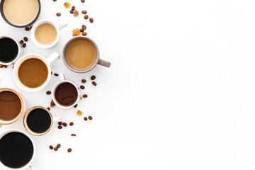 Many cups of coffee on white desk top view space for text
