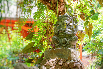 Ganesha statue in asian hotel resort. Bali, Indonesia