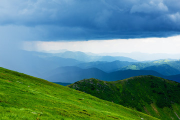In the mountains before the rain. Fog and clouds.