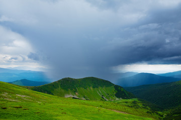 In the mountains before the rain. Fog and clouds.