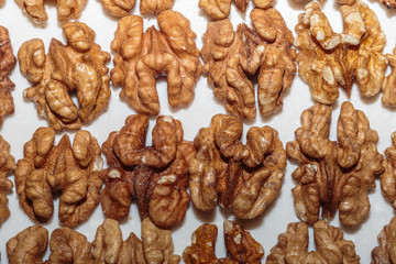 Walnut kernels on a kitchen table. Vegan food. Concept of healthy food.