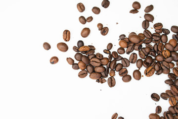 Coffee beans on white background. Top view. Shallow depth of field.
