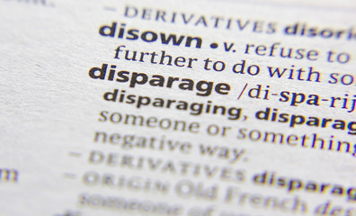 Disparage word or phrase in a dictionary.