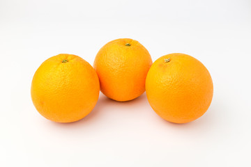 Fresh oranges on white background
