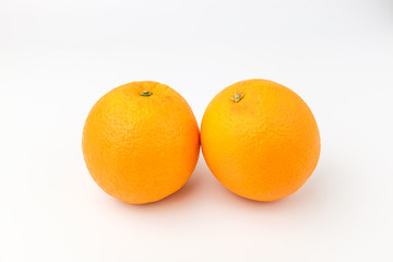 Fresh oranges on white background