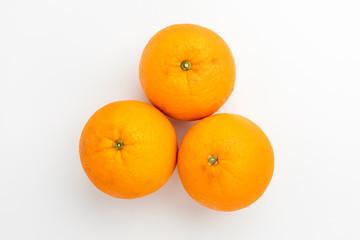 Fresh oranges on white background