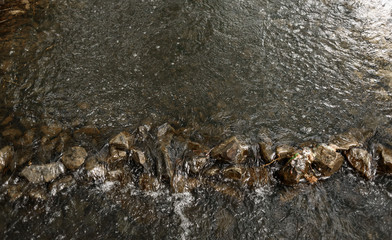 gorge on a mountain river of stones
