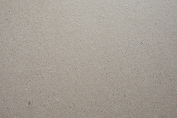 grey brown cardboard texture background with simple surface. High resolution photo.