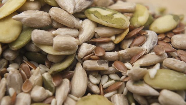 Unsalted sunflower and pumpkin seeds close up
