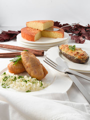 Berenjenas rellenas, quesos y  san jacobos. Stuffed aubergines, cheeses and San Jacobos.