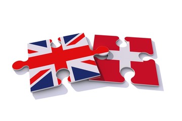 United Kingdom and Switzerland flag puzzle pieces. 3D rendering