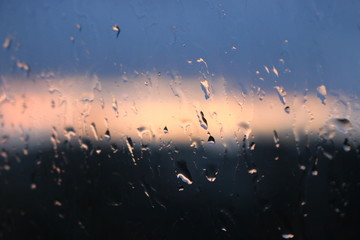 Background. Rain drops on glass.