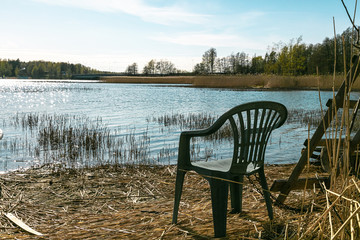 Fototapeta premium Old chair by the sea