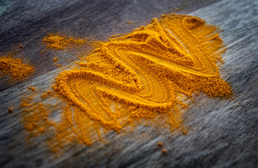 Turmeric on wooden board