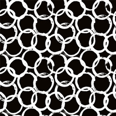 Hand drawn circles seamless pattern. Chain mail, ring or circles design. Repeat disk texture. Modern background. Vector simple craft or wrapping paper. White on black color surface.