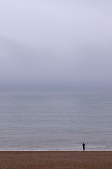 alone on a beach isolating