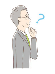 不安・疑問・悩みを感じる男性の横顔