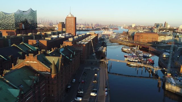 Drone flies above harbour area in hamburg City while corona lockdown 
