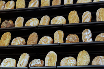 Fresh bread on shelves in a bakery
